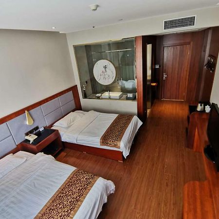 Beijing Gongmei Blue Peacock Business Hotel Bagian luar foto