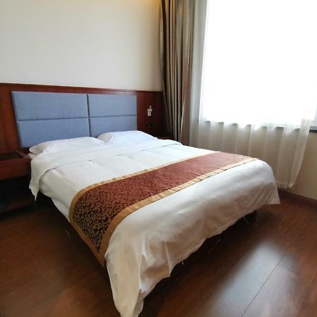 Beijing Gongmei Blue Peacock Business Hotel Bagian luar foto