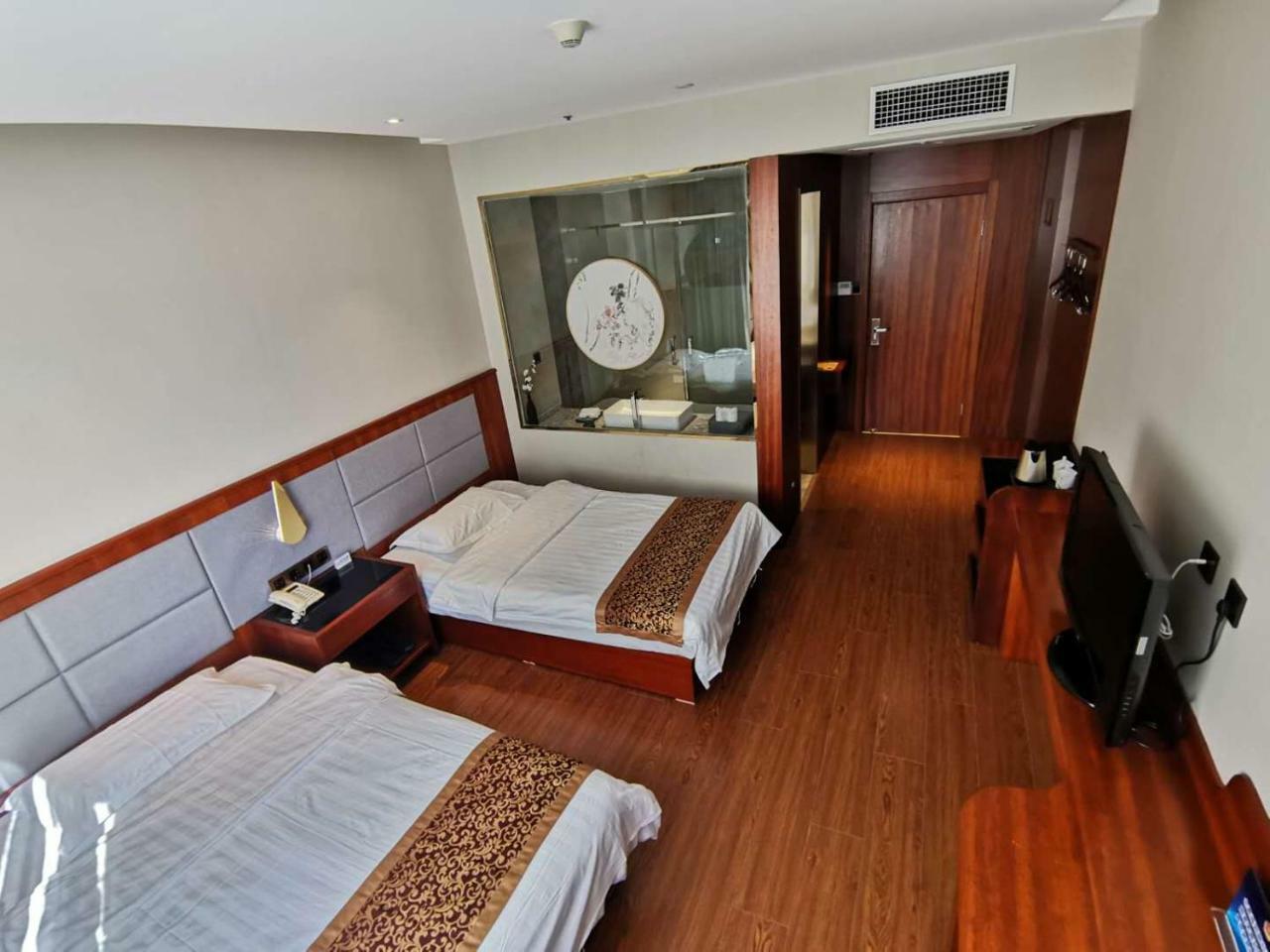 Beijing Gongmei Blue Peacock Business Hotel Bagian luar foto