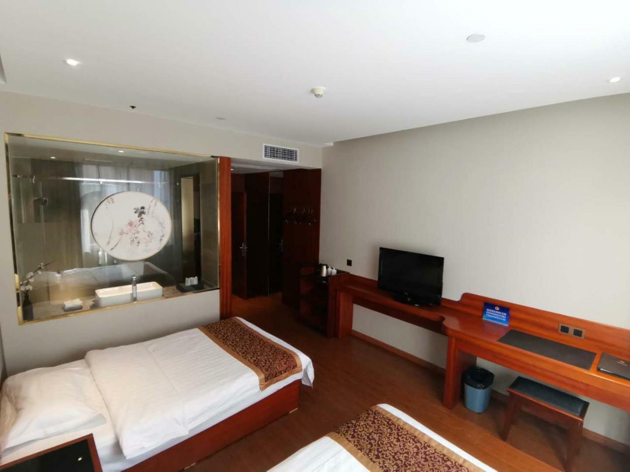 Beijing Gongmei Blue Peacock Business Hotel Bagian luar foto